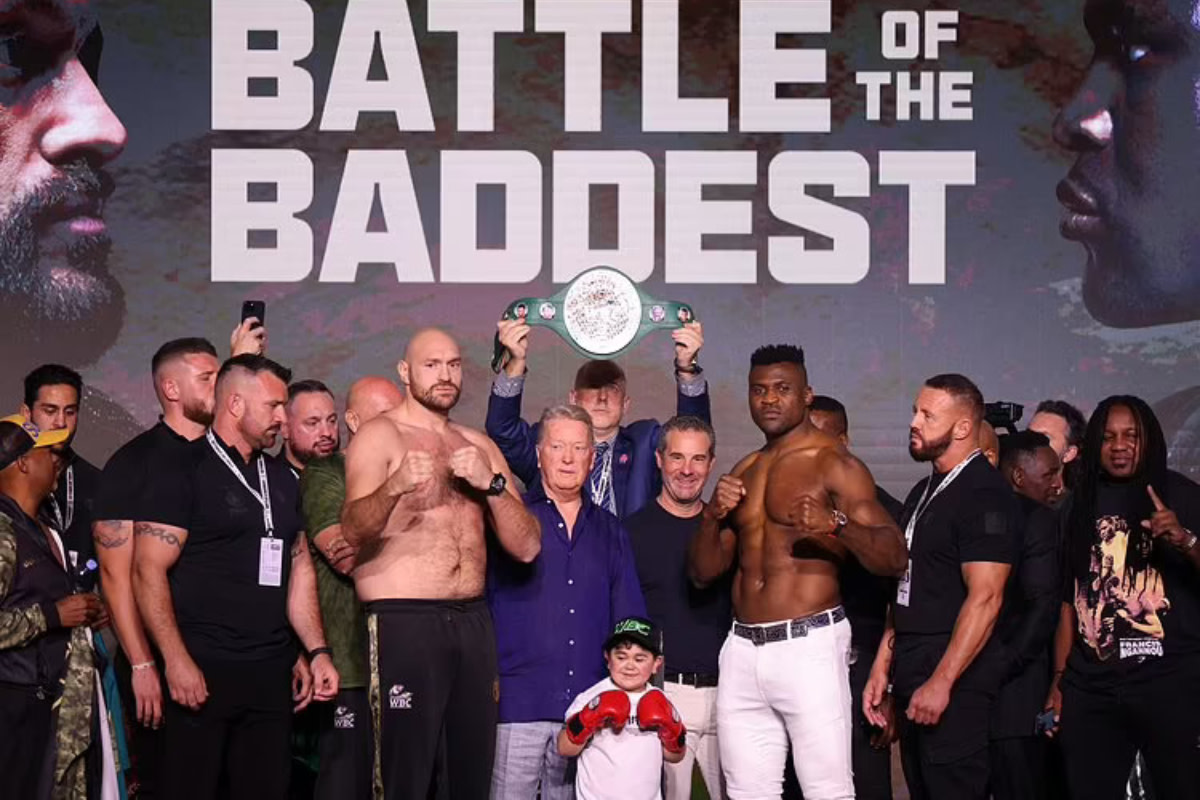 Tyson Fury and Francis Ngannou pose for the media ahead of their October 28 boxing showdown in Saudi Arabia.
